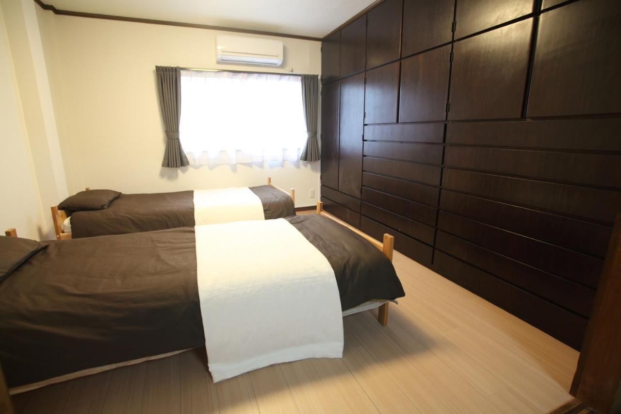 Guest House Futaba Осака Экстерьер фото